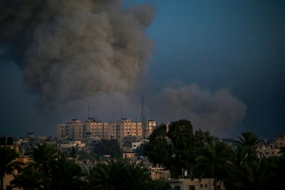 Smoke rises during Israeli military operations east of the Al Maghazi and Al Bureij refugee camps, in the southern Gaza Strip. EPA