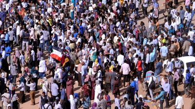 Sudanese demonstrators chant slogans as they march during anti-government protests in Khartoum on December 25, 2018. Reuters