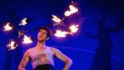 An artist performs with fire during a show at the Kiev Fire Fest in Kiev, Ukraine. Performers from Greece, Belarus, Lithuania, Slovakia, USA, Czech Republic, Scotland and Ukraine took part in the two-day festival. Roman Pilipey / EPA