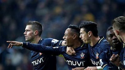 Southampton's English defender Nathaniel Clyne, second from left, celebrates scoring the equalising goal during the English Premier League football match between Aston Villa and Southampton at Villa Park in Birmingham on November 24, 2014. AFP PHOTO / ADRIAN DENNIS