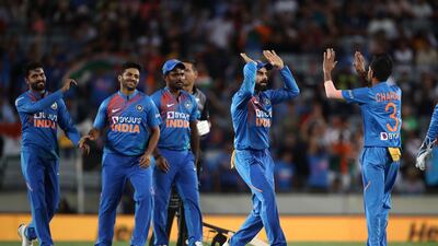 India celebrate the wicket of New Zealand captain Kane Williamson. Getty