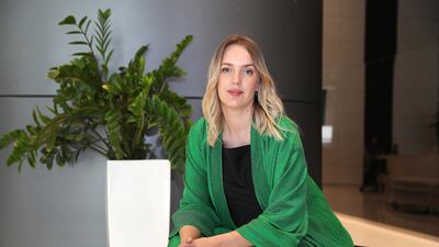 Immigration consultant Oana Radu believes money is a means to an end, not the end itself. Pawan Singh / The National