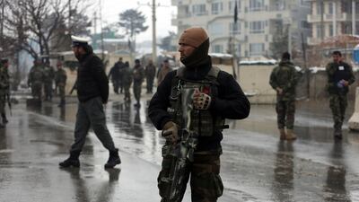 National army soldiers stand guard at the site of suicide attack near the military academy in Kabul, Afghanistan. AP Photo