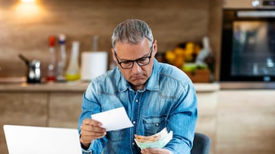 One way to save money is by putting off spending until you are more financially secure. Getty Images