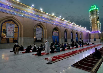 Muslims perform evening prayer at the Sunni shrine of Abdul-Qadir Al Gailani in Baghdad, ahead of the start of Ramadan. AP
