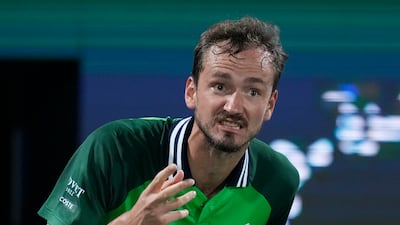 Daniil Medvedev talks to his coach after losing a point to Lorenzo Sonego. AP