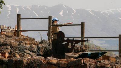 Members of the United Nations Disengagement Observer Force monitor the Syrian side of the border with Israel in the Israeli-occupied Golan Heights. AFP