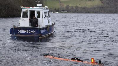 Munin, an intelligent marine robot, on the surface of Loch Ness. Russell Cheyne / Reuters