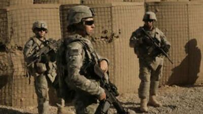 US Army soldiers on a foot patrol in the village of Zaganiyah, about 60 kilometres from Baghdad. Mr Malaki has raised the prospect of setting a timetable for their withdrawal.