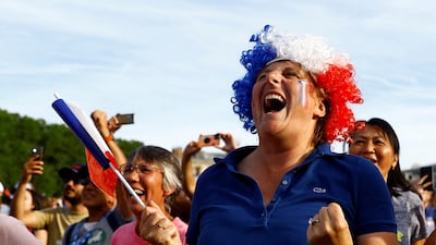 French fans enthralled by the Olympic swimming. Reuters