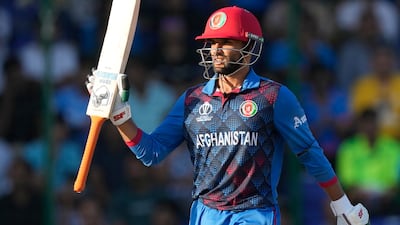 Afghanistan's Azmatullah Omarzai celebrates after reaching his half century. AP