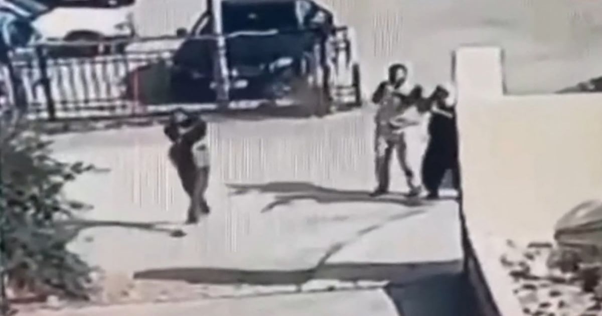 Photo: The National A screengrab from CCTV footage shows gunmen attacking the Greek Orthodox church in Hamoud. AFP