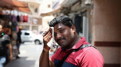 A heat awareness campaign was conducted in the UAE last summer, to advise blue collar workers on the dangers of working outdoors. Chris Whiteoak / The National