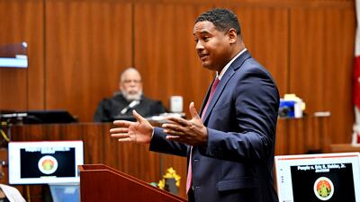 Deputy district attorney John McKinney speaks to the jury during closing arguments in the People v Eric Holder. AP