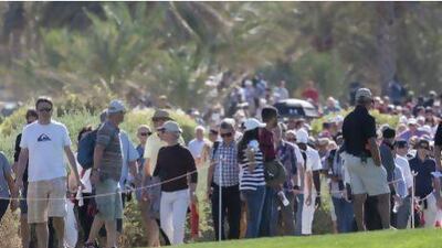 Golf fans lined the fairways and putting greens just to catch a glimpse of Tiger Woods and Rory McIlroy in action during the first two rounds of the Abu Dhabi HSBC Golf Championship.