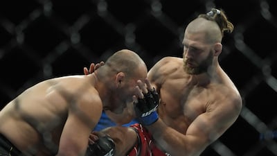 Glover Teixeira and Jiri Prochazka contest their light heavyweight title fight at UFC 275. AFP