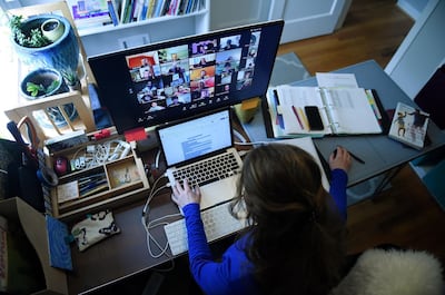 Lauryn Morley, a school substitute teacher works from her home due to the coronavirus outbreak in Arlington, Virginia. AFP