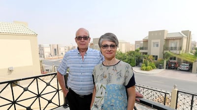 Dubai residents Lina and Omar Hariri, say they will benefit from new rules allowing husbands to work on their wife's visa. Chris Whiteoak / The National