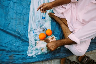 Iftar on the first day of Ramadan by Masjid Kuwaiti Lootha Mosque. Hundred of people gathered to share Iftar