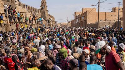 A crowd gathers for the annual replastering of the 14th century Djingareyber Mosque in Timbuktu. AFP