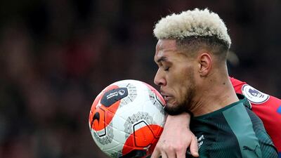 Joelinton takes a ball to the face during a Premier League match against Crystal Palace in February. Reuters
