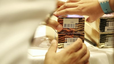 Businesses must stop selling or displaying products found to be in breach of the commercial fraud law. Pawan Singh / The National