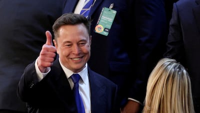 Elon Musk gives a thumbs-up in the gallery during a speech by US President Donald Trump to a joint session of Congress. Reuters