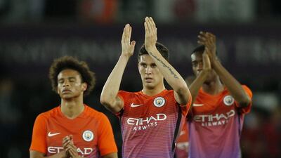 Manchester City’s John Stones applauds fans after the game. Andrew Boyers / Action Images / Reuters