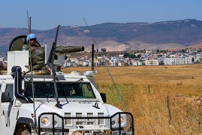 UN peacekeepers patrol on the Lebanese side of the Lebanese-Israeli border in the southern village of Majidiyeh with border village Ghajar in the background, Lebanon. AP Photo