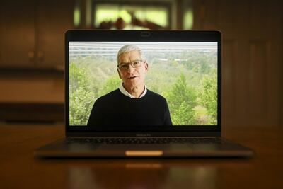 Tim Cook, chief executive, speaks during a virtual product launch seen on a laptop computer in Tiskilwa, Illinois. Daniel Acker/Bloomberg