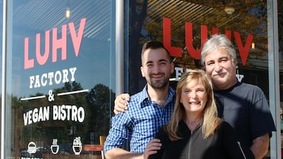 From left, Facundo Lucci, with his mother Silvia and father Daniel, who lost their family business in the Great Recession of 2007 but have since fought back with a new vegan venture in Pennsylvania. Rob Crilly for The National