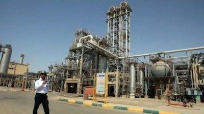 Since tough US and European Union measures came into full effect last month, Iran's crude exports halved to about 1.1 million barrels a day (bpd), Bloomberg data show. AP Photo