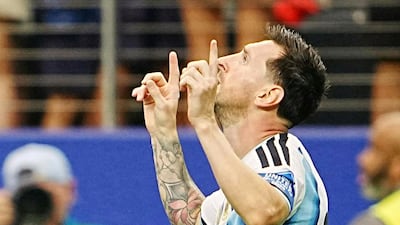Lionel Messi celebrates after scoring his record-breaking goal against Austria. AFP