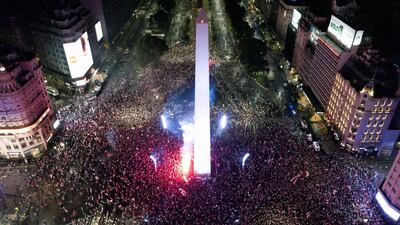 Fans of River Plate celebrate at the Plaza de la Republica square in Buenos Aires. AFP