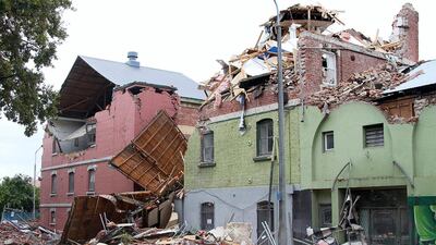 Badly damaged structures along Fitzgerald Avenue surrounded in rubble in Christchurch on February 23, 2011, a day after the city was rocked by a 6.3 magnitude earthquake. AFP