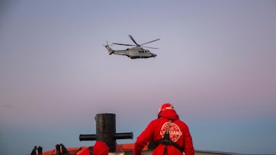 A rescue helicopter leaves after evacuating a mother and her new born baby following their rescue with other nearly 300 migrants off the coast of Libya. AFP