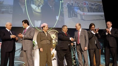 Oil workers at a drilling facility in Taq Taq.