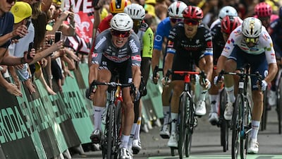 Alpecin - Deceuninck team's Belgian rider Jasper Philipsen cycles to the finish line to win the first stage. AFP