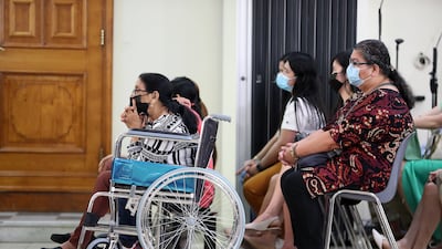 People attend the Easter Sunday Mass held at St Mary's Catholic Church in Dubai. Pawan Singh / The National