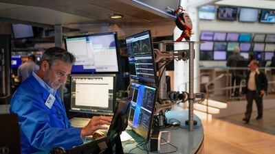 Traders work at the New York Stock Exchange. The key factor behind the turmoil in markets is the Fed, which has been rapidly tightening monetary policy to fight the highest inflation in decades. AP