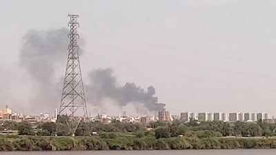 A picture taken from Omdurman shows smoke billowing north of Khartoum. AFP