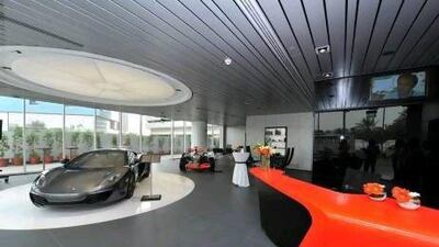 The new showroom houses an MP4-12C and Lewis Hamilton's 2007 F1 car.