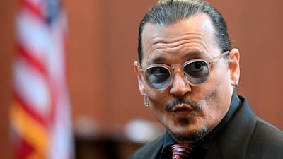 Actor Johnny Depp arrives for the 13th day of the trial. AP