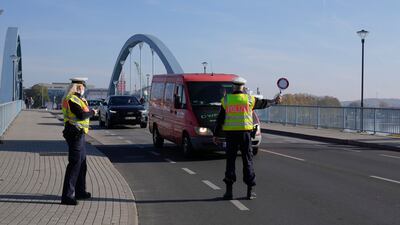 German federal police stop a van at a border crossing with Poland. AP
