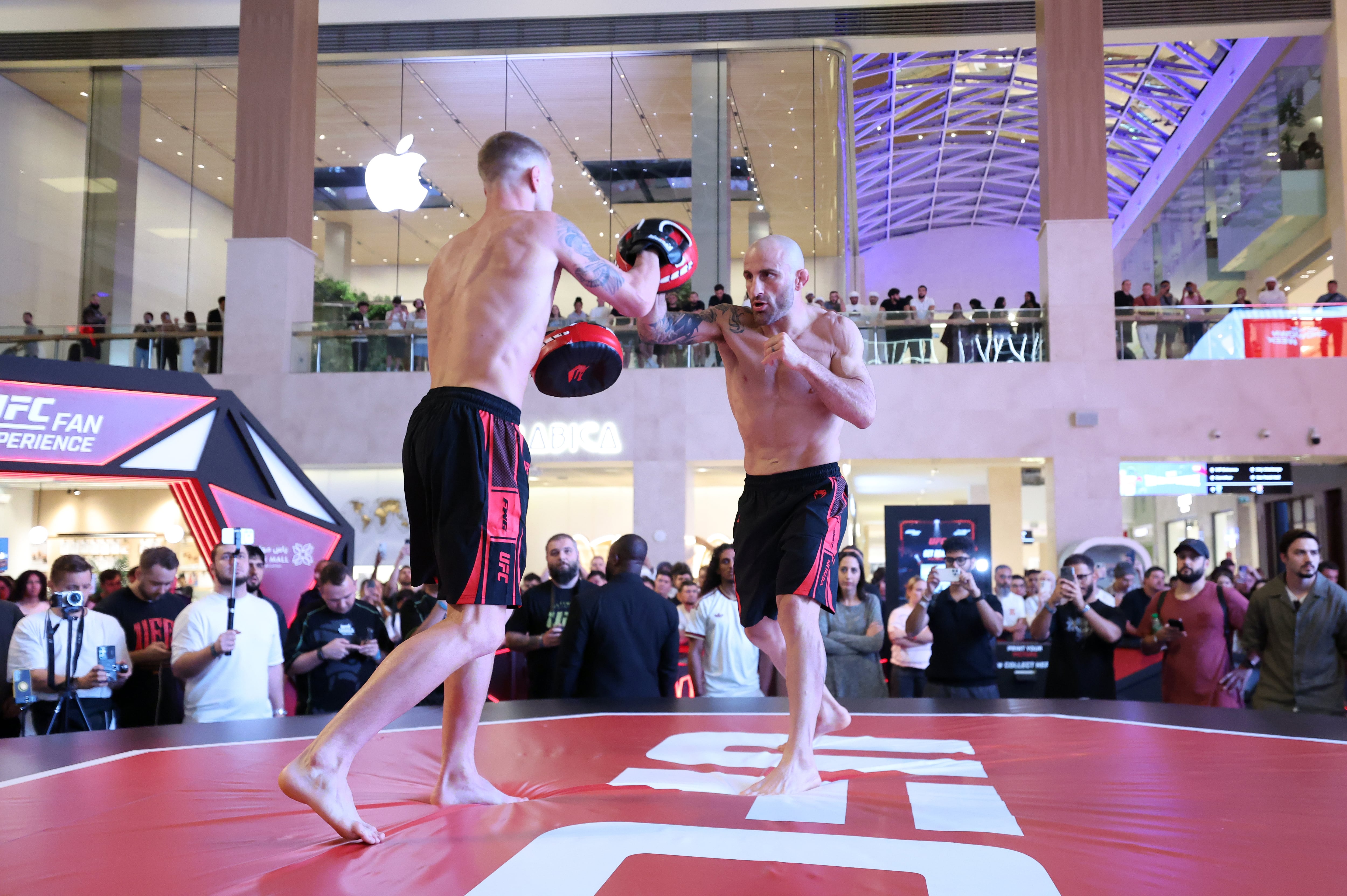 Champion Alexander Volkanovski takes part in an open workout.