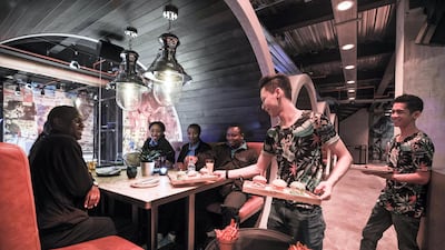 Grab a booth in the restaurant. Leslie Pableo / The National