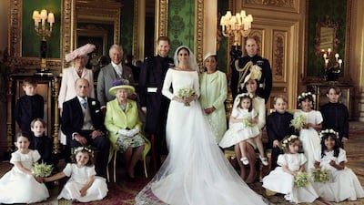 The official portrait shows Meghan and Harry with Harry's brother, sister-in-law, grandparents, father Charles and Camilla; and Meghan with her mother. The young bridal party also sat for the photo. Twitter/KensingtonPalace