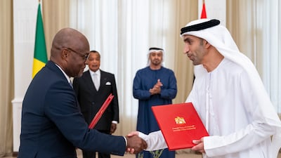 Dr Thani Al Zeyoudi, UAE Minister of State for Foreign Trade, and Christian Yoka, Minister of Finance of the Republic Congo, exchange the Cepa documents