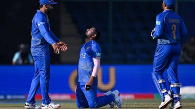 UAE's Junaid Siddique celebrates taking the wicket of Canada's Saad Bin Zafar. AFP