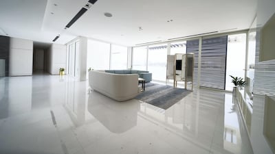 The property boasts floor-to-ceiling windows throughout. Courtesy BlackBrick Property